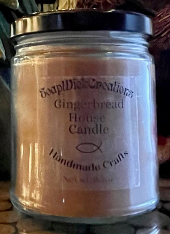 Photo of a brown candle with the scent of ginger bread