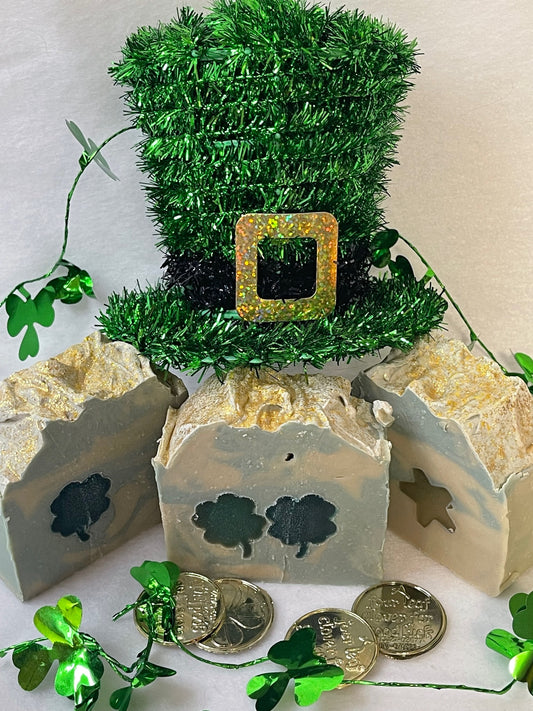 Photo of luck of the Irish soap with green clover and/or gold star embed with a green Irish, top hat