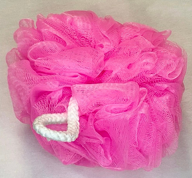 Picture of a hot pink, 6 inch loofah