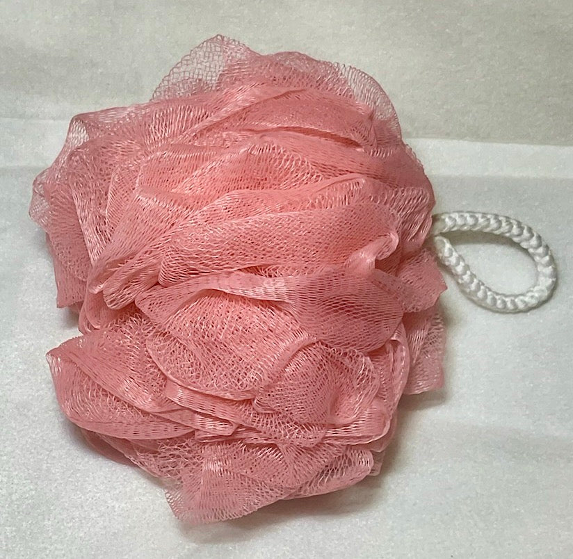 Picture of a light pink 6 inch loofah